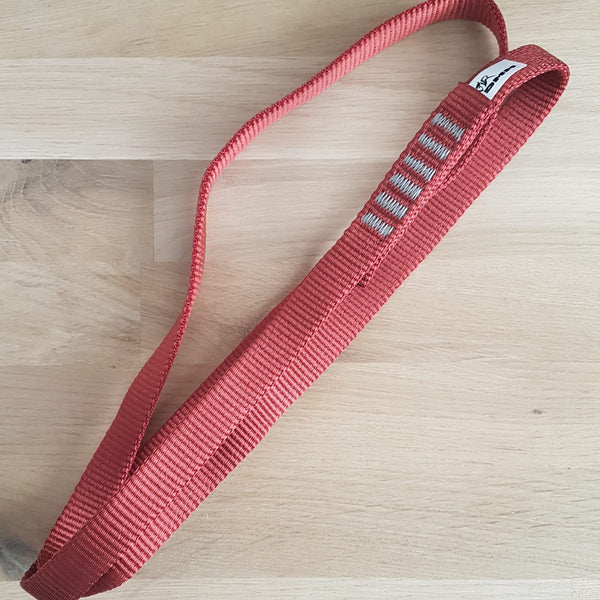 DMM 16mm Nylon Sling Red 60cm on wooden display panel