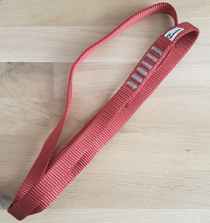 DMM 16mm Nylon Sling Red 60cm on wooden display panel
